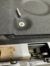 CoverGuard security fastener installed on a Ford truck tailgate with the proprietary tamper-resistant drive bit