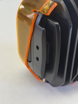Close-up of a amber light with a white background