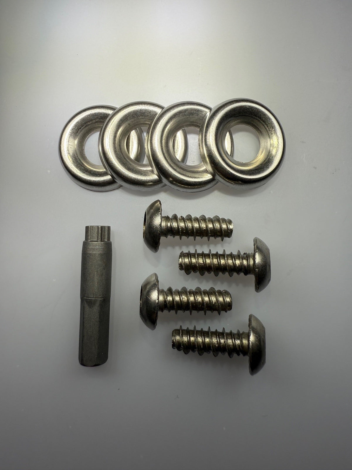 LightGuard Lite taillight security fastener kit - stainless steel screws, finishing washers, and proprietary drive bit for Ford trucks