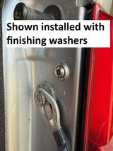 LightGuard Lite taillight security fastener installed on a Ford truck taillight housing, shown with finishing washers