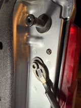 Installing LightGuard Lite taillight security fastener on a Ford truck using the proprietary tamper-resistant drive bit