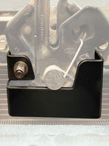 HoodGuard bracket installed on a hood latch